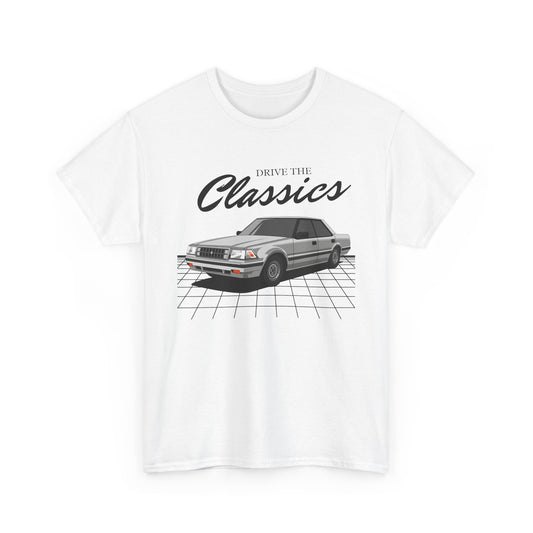 The seventh-gen Toyota Crown (S120, 1983–1987) combined 1980s executive style with rear-wheel drive and digital dash luxury. This T-shirt revives the golden era of Japanese flagship sedans.