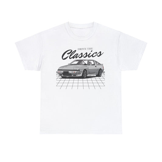 Mitsubishi Starion Classic T-Shirt – white cotton shirt featuring the Mitsubishi Starion (1982–1989) with distinctive wedge-shaped design and pop-up headlights, designed for Japanese sports car enthusiasts
